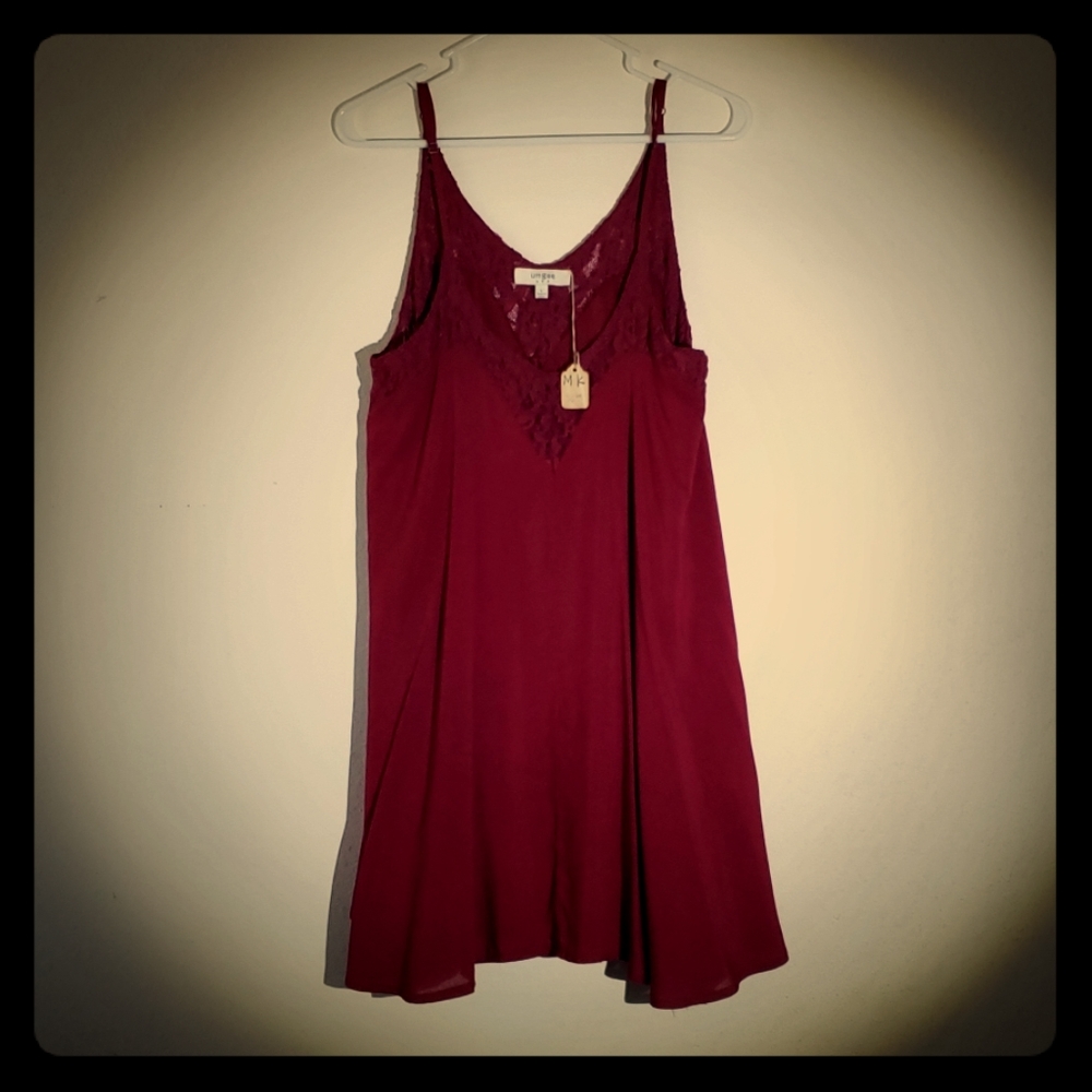 Umgee Tunic length women's spaghetti strap top.